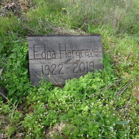 mother and daughter planting memorial tree